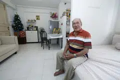 Katil ‘queen size’ dan sofa baru antara perabot yang dihadiahkan kepada Encik Marshall Garnell yang menetap di rumah sewa sebilik di Chai Chee sempena Krismas.
