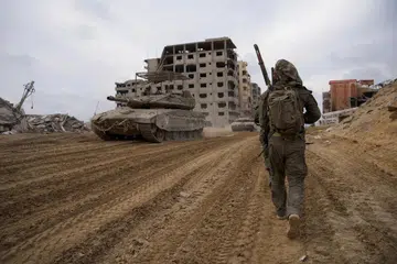 OPERASI KETENTERAAN: Pemerintah sayap kanan Israel terus mempertahankan haknya untuk menjalankan operasi ketenteraan di Gaza bagi menjejak militan Hamas, meskipun ia mengakibatkan korban jiwa yang begitu besar. 