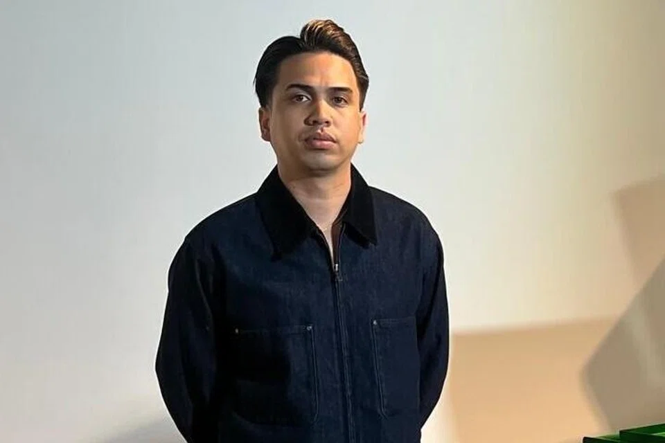 Tukang gunting rambut, Encik Muhammad Hariz Mohd Zol, 27 tahun.