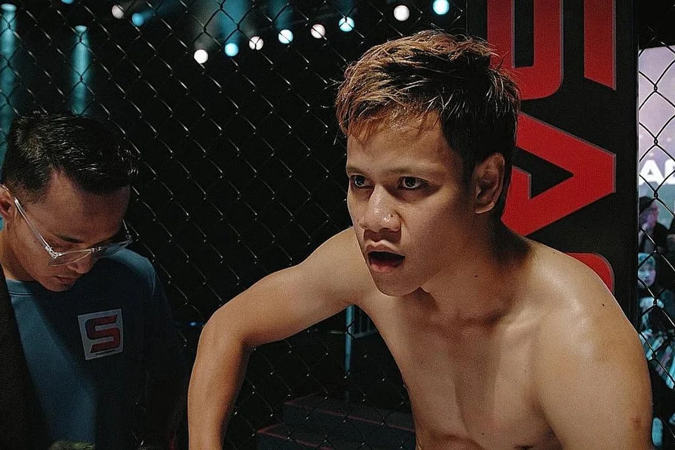 Juara tinju profesional pertama Singapura, Muhamad Ridhwan Ahmad - Foto MEDIACORP SURIA