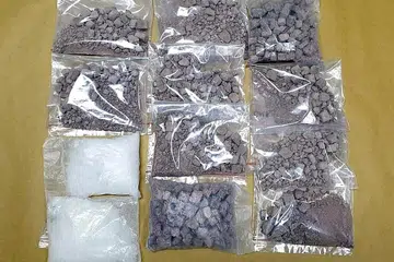 RAMPASAN DADAH: Dadah yang dirampas termasuk 2,793 gram heroin dan 519 gram 'Ice'. - Foto CNB