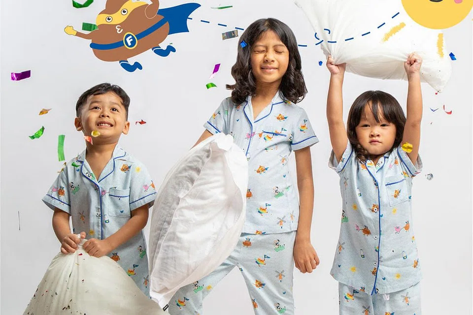 KERJASAMA DENGAN JENAMA TERKENAL: Maison Q bekerjasama dengan jenama susu antarabangsa, Friso untuk mengeluarkan baju tidur kanak-kanak. (Gambar atas) Cik Suhana Ab. - Foto MAISON Q