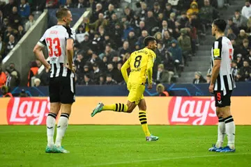 RAI JARINGAN: Pemain tengah Felix Nmecha (jersi kuning) meraikan jaringannya bagi Borussia Dortmund, yang menewaskan Newcastle 1-0 dalam perlawanan Liga Juara-Juara pada Rabu. 