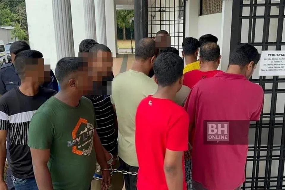 Seramai 15 lelaki warga Bangladesh dibawa ke Kompleks Mahkamah Balik Pulau, Pulau Pinang, bagi mendapatkan perintah reman kerana merusuh.