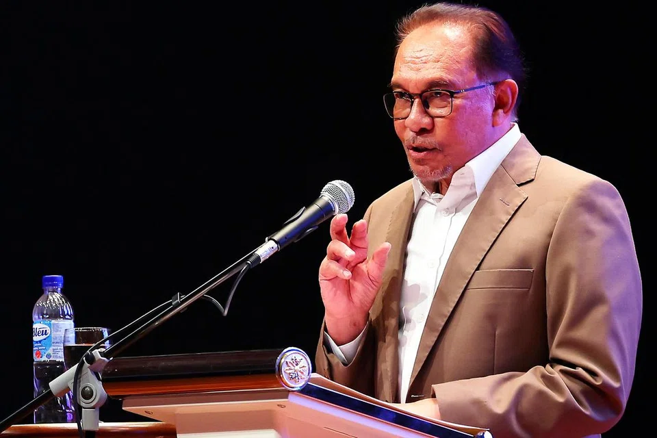 TERUSKAN DIALOG: Datuk Seri Anwar Ibrahim berkata kita tidak boleh selesaikan masalah dengan membakar atau mencemarkan kitab suci masing-masing, tetapi harus membaca dan menyertai dialog mengenainya.