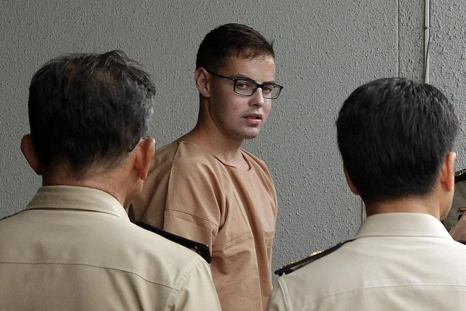 HADAPI TUDUHAN: David James Roach menghadapi tuduhan rompakan dan pengubahan wang haram. - Foto BANGKOK POST