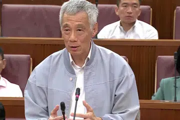Menteri Kanan, Encik Lee Hsien Loong.