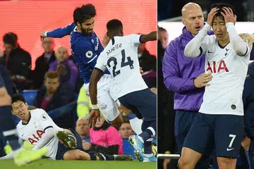 TERKEJUT: Penyerang Spurs, Son Heung-Min, begitu terjejas setelah terlibat dalam insiden yang menyebabkan kecederaan serius kepada pemain Everton Andre Gomes (gambar kiri). Son dilayangkan kad merah. - Foto-foto AFP