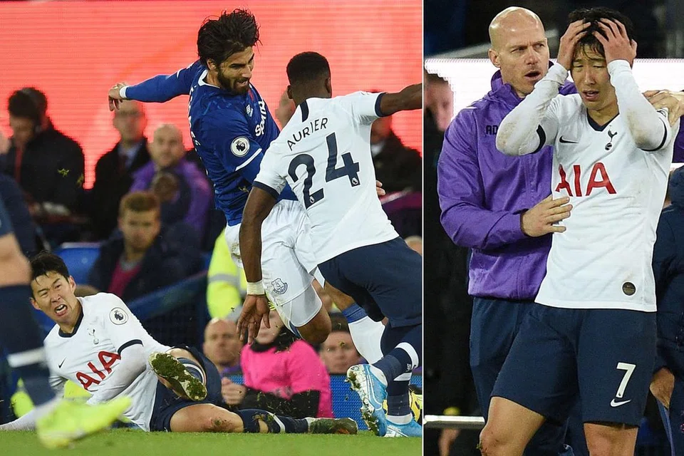 TERKEJUT: Penyerang Spurs, Son Heung-Min, begitu terjejas setelah terlibat dalam insiden yang menyebabkan kecederaan serius kepada pemain Everton Andre Gomes (gambar kiri). Son dilayangkan kad merah. - Foto-foto AFP