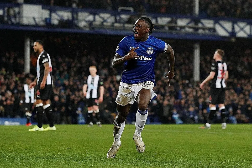 GOL SULUNG: Moise Kean meraikan gol pertamanya untuk Everton dalam perlawanan menentang Newcastle United di Goodison Park kelmarin. - Foto REUTERS 