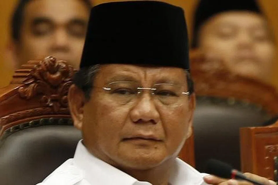 BAWA KE MAHKAMAH: Encik Prabowo menghadiri perbicaraan di Mahkamah Perlembagaan di Jakarta kelmarin bagi mendengar rayuannya berkaitan keputusan pilihan raya Presiden. - Foto REUTERS