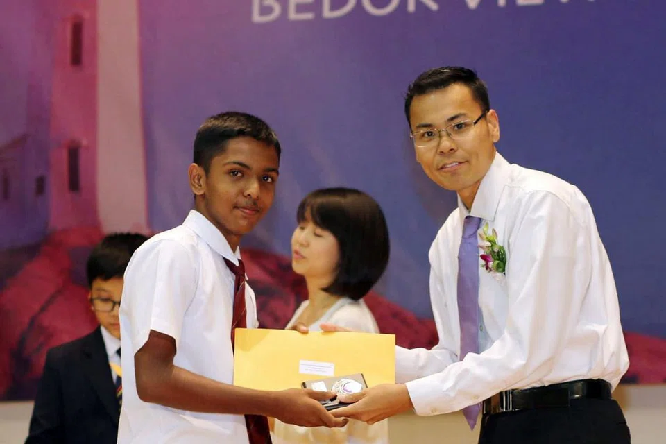 PRIHATIN TENTANG PENDIDIKAN: Encik Mohamed Faizal memulakan biasiswa di sekolah lamanya termasuk Sekolah Menengah Bedok View.