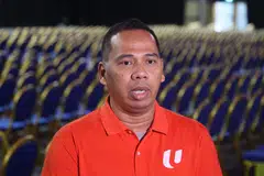 Naib Presiden NTUC, Encik Abdul Samad Abdul Wahab. 