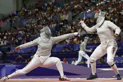 Nada Hafez (kanan) yang dilihat bersaing dengan Hayoung Jeon (kiri) dari Korea Selatan berkata beliau bukan sekadar bangga dengan penyertaannya, malah bersaing ketika beliau sedang hamil.