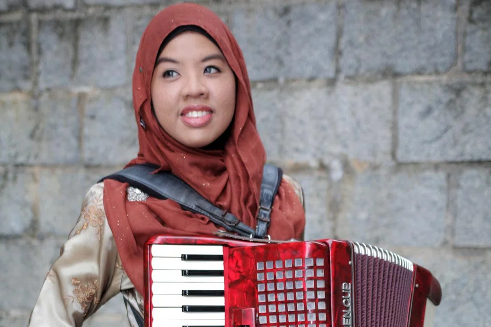 CIK SYAFIQAH ’ADHA SALLEHIN: Penggubah muzik muda ini ingin menggunakan muzik untuk menyebar bahasa dan budaya Melayu.
