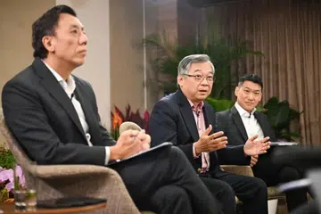 (Dari kiri) Pemangku Menteri Pengangkutan merangkap Menteri Negara Kanan (Kewangan), Encik Jeffrey Siow; Timbalan Perdana Menteri, Encik Gan Kim Yong; dan Pemangku Menteri Kebudayaan, Masyarakat dan Belia, Encik David Neo, pada sidang media Semakan Strategi Ekonomi (ESR) pada Januari lalu.