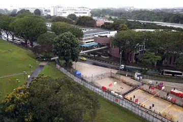 BAKAL DIBANGUNKAN: Pusat Bandar Woodlands Lama (gambar atas) dijangka berubah wajah dengan peluasan Pusat Pemeriksaan Woodlands dan juga projek pembangunan semula kawasan itu. - Foto THE STRAITS TIMES