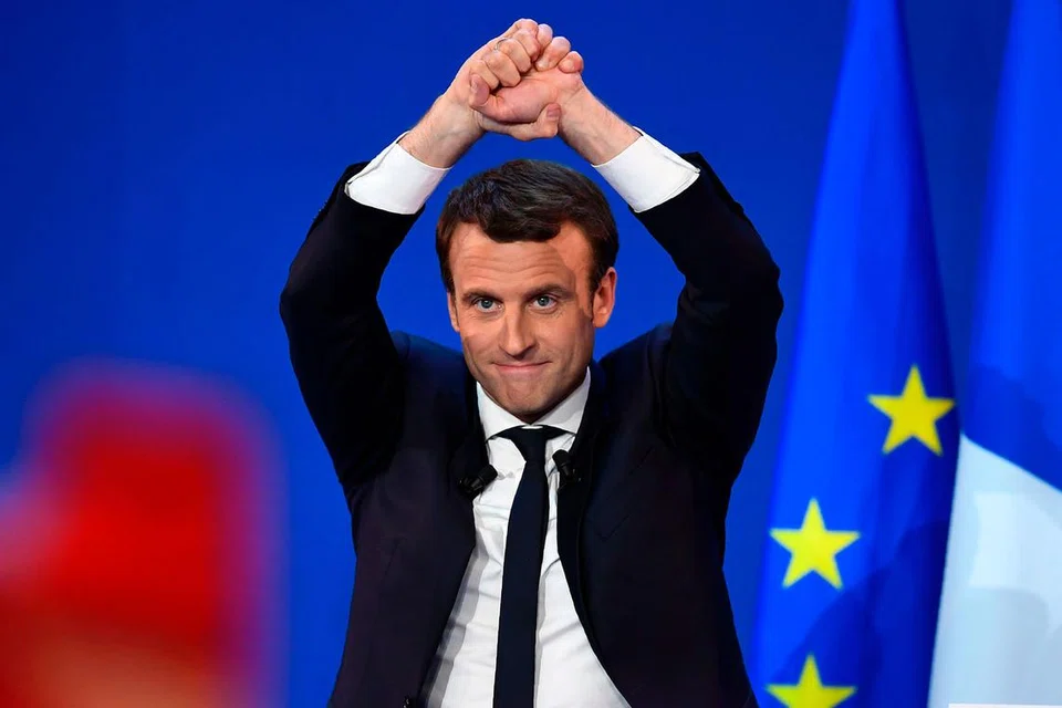 ENCIK EMMANUEL MACRON: Diramal dapat mengalahkan Cik Le Pen dalam pusingan kedua undi pada 7 Mei. - Foto AFP
