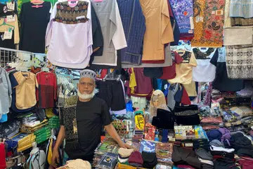 Encik Husin Yusof Ibrahim, 57 tahun, mengambil peluang penutupan sementara Pasar Geylang Serai untuk menunaikan umrah bersama isterinya. 