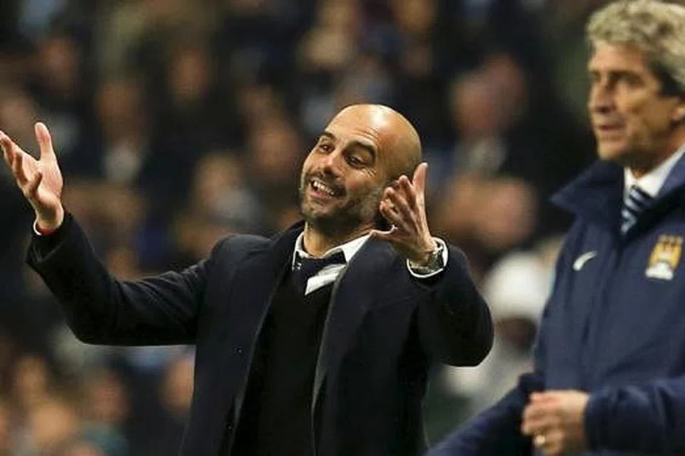 AMBIL ALIH: Bos Bayern Pep Guardiola pernah 'bersemuka' dengan pengurus Manchester City Manuel Pellegrini dalam Liga Juara-Juara pada November 2014. Guardiola kelmarin disahkan sebagai pengurus baru City, menggantikan Pellegrini bagi permulaan musim 2016/2017. - Foto REUTERS