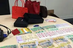 HASIL SERBUAN: SPRM antara lain merampas wang tunai, tas tangan dan jam tangan pelbagai jenama di rumah Datuk Mohd Arif. - Foto THE STAR