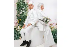 CETUS TANDA TANYA: Naufal (kiri) dan Nuha (kanan) memuat naik gambar mereka mengenakan busana perkahwinan, dan mendedahkan 24 September ini dilaporkan bakal menjadi hari terpenting mereka. Ada juga pihak yang mendakwa ia gimik untuk melancarkan single lagu baru selepas kejayaan lagu 'Casablanca' yang berjaya meraih lebih 20 juta tontonan di YouTube. - Foto INSTAGRAM NUHA BAHRIN