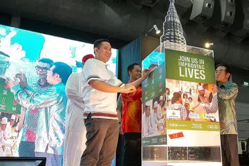 MALAYSIA FEST 2018: Encik Amrin Amin melancarkan Malaysia Fest 2018 di Dewan 6A Singapore Expo Jumaat lalu. - Foto BM oleh ZALEHA ABDUL KADIR