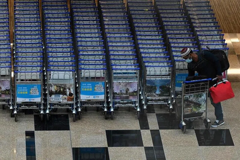 Foto hiasan LAPANGAN TERBANG CHANGI oleh AFP/ROSLAN RAHMAN