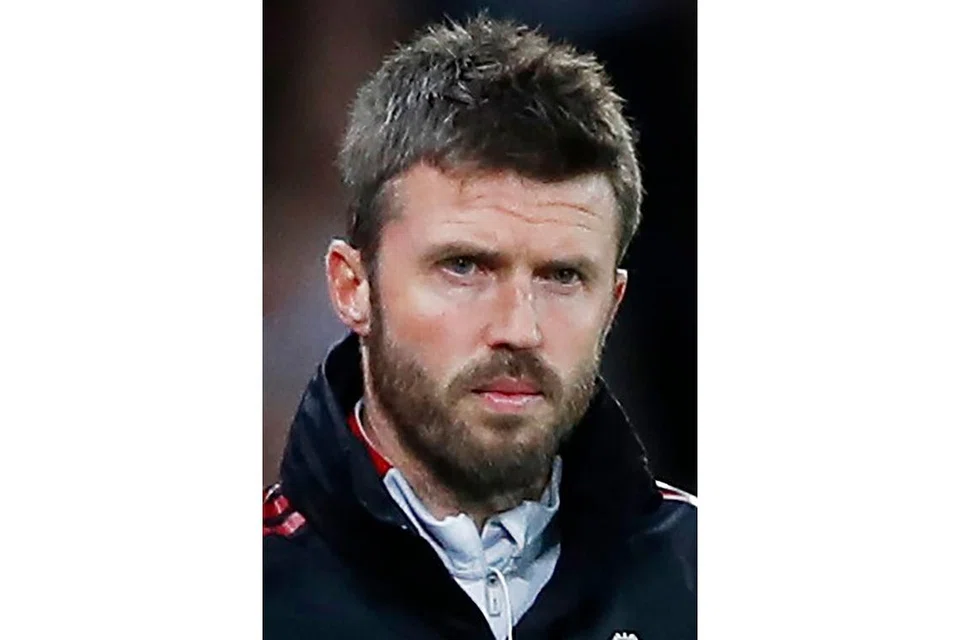 Michael Carrick (gambar atas).