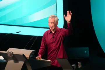 Perdana Menteri Encik Lee Hsien Loong menyampaikan ucapan Rapat Hari Kebangsaan. - Foto BH oleh KELVIN CHNG