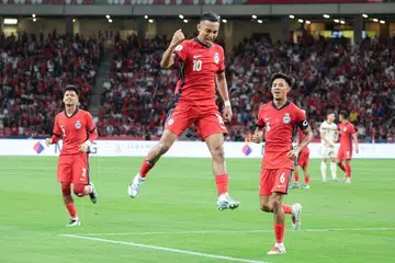 Faris Ramli (tengah), bersama Irfan Najeeb (kiri) dan Shah Shahiran, melompat kegembiraan selepas keputusan 2-0 menentang Thailand dalam Kejohanan Asean 2024, sebelum Thailand bangkit menang 4-2.