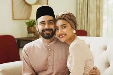 KEMBALI BERAYA: Penyanyi Yuna dan suaminya, Adam Sinclair, terpaksa menyambut Syawal pertama sebagai suami isteri di Lapangan Terbang Antarabangsa Narita, Jepun, kerana menunggu pesawat transit ke Kuala Lumpur dari Los Angeles. - Foto INSTAGRAM YUNA