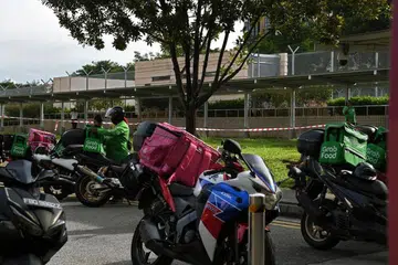 Pekerja penghantaran kekurangan perlindungan pekerjaan asas yang dimiliki kebanyakan pekerja lain. - Foto fail