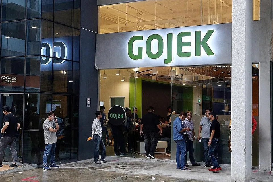 TIADA RUNDINGAN: Gojek sifatkan laporan mengenai rundingan dengan Grab untuk saling bergabung adalah tidak tepat. - Foto ZAOBAO, REUTERS