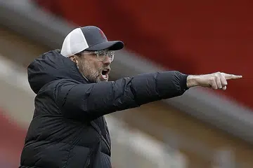 ADA KONTRAK: Jurgen Klopp berkata beliau tidak boleh dikaitkan dengan jawatan sebagai pengurus Jerman kerana beliau masih diikat kontrak dengan Liverpool. - Foto EPA-EFE