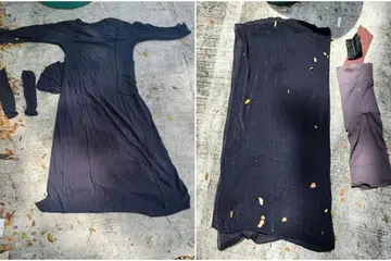 GAGAL MEROMPAK: Polis merampas baju labuh lengan panjang berwarna hitam, tudung dan sarung tangan yang dikenakan suspek semasa dia cuba merompak minimart di Lorong 1 Toa Payoh.