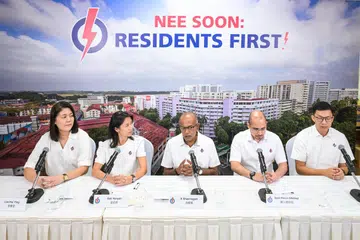Menteri Ehwal Dalam Negeri merangkap Undang-Undang, Encik K. Shanmugam, mengumumkan empat muka baru yang membentuk pasukan PAP di GRC Nee Soon. (Dari kiri) Cik Lee Hui Ying, Cik Goh Hanyan, Dr Syed Harun Alhabsyi dan Encik Jackson Lam.