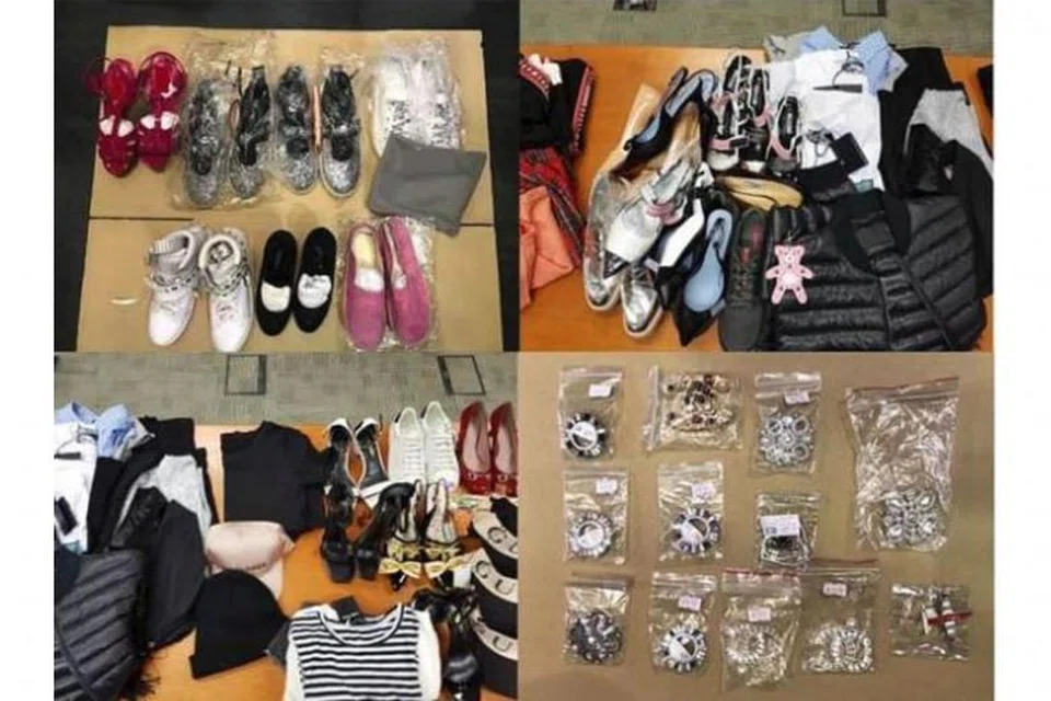 BARANG BERJENAMA PALSU: Barang yang dirampas polis termasuk kasut, pakaian, beg, topi dan aksesori yang dianggarkan bernilai sekitar $77,000.