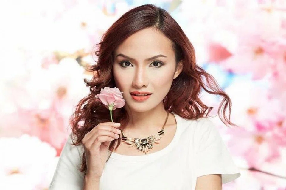 TIDAK SUKA DUDUK DIAM: Surya Rahmanty Sudirman, yang bertugas sepenuh masa sebagai eksekutif pemasaran di firma teknologi maklumat, juga menjadi peragawati di Singapura dan luar negara bagi menimba pengalaman. - Foto ihsan SURYA RAHMANTY SUDIRMAN