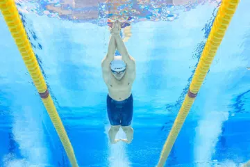 Perenang lelaki setempat, Encik Teong Tzen Wei, semasa menyertai Piala Dunia Renang 2024.