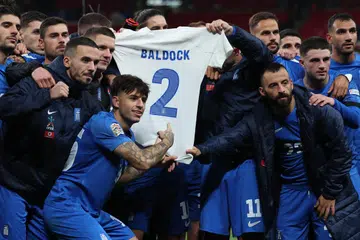 Bagi memberi penghormatan kepada bekas pemain George Baldock, yang meninggal dunia, pemain Greece menjulang jersinya ketika menentang England dalam perlawanan Liga Negara-Negara di Wembley pada 11 Oktober.