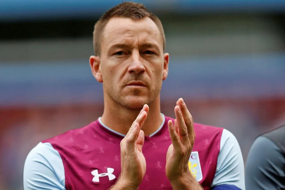 AKHIRNYA BERSARA: John Terry mengambil keputusan untuk bersara daripada bola sepak pada usia 37 tahun. - Foto REUTERS