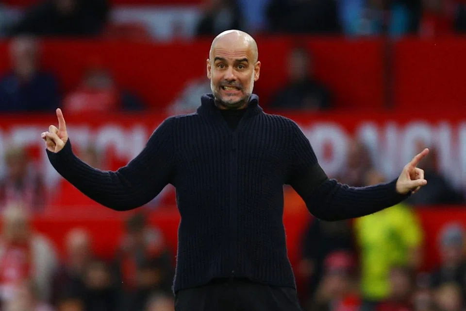 TIDAK MAHU TERLALU YAKIN: Pengurus Manchester City, Pep Guardiola, menolak segala andaian bahawa pasukannya akan memenangi kejuaraan liga mereka yang keempat berturut-turut.