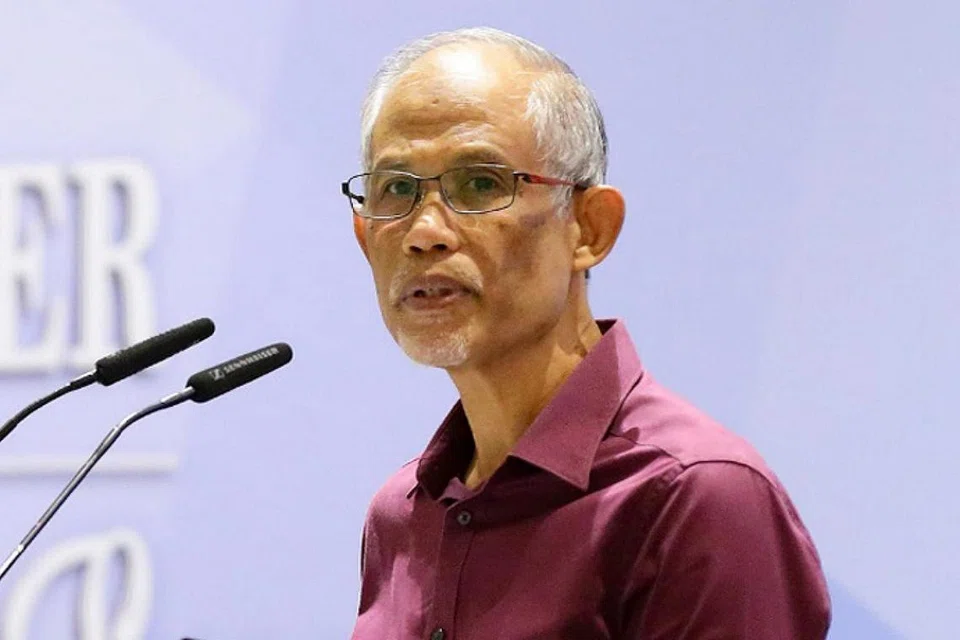 BERI CONTOH VISI IDENTITI MUSLIM SINGAPURA: Encik Masagos semasa menyampaikan ucapannya dalam Seminar Pelan Kerja Muis semalam.
