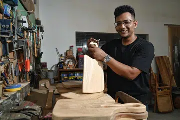 TERUS BERSEMANGAT: Syed Ahmad Abdul Rahman Alhabshee merupakan pemilik syarikat Urban Salvation yang membina perabot bina khusus yang diperbuat daripada kayu yang diguna semula seperti jati dan kayu tempatan.