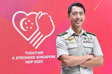 SUASANA BERBEZA: Pegawai Jawatankuasa Eksekutif NDP2020, Brigadier-Jeneral (BG) Frederick Choo, bersama tema, logo dan konsep perbarisan tahun ini. - Foto JAWATANKUASA EKSEKUTIF NDP 2020.