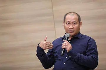 GEMBIRA ADA KERJASAMA LEBIH RAPAT: Encik Muhammad Faizal Othman akur ComLink sangat bermanfaat dalam membantu keluarga yang kurang bernasib baik. - Foto BH oleh ONG WEE JIN