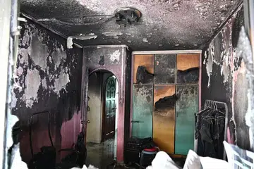 DILIPUTI JELAGA: Kebakaran yang melibatkan kandungan bilik tidur di flat Hougang.