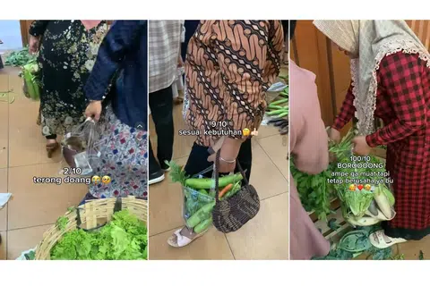 PILIH SAHAJA: Tetamu kelihatan membungkus sayur pilihan mereka di acara walimah itu.