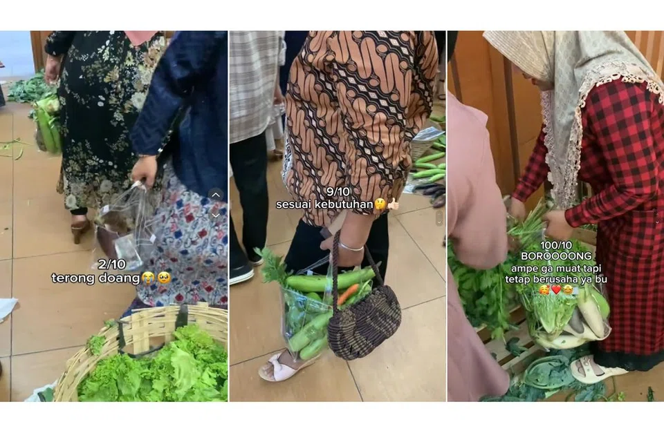PILIH SAHAJA: Tetamu kelihatan membungkus sayur pilihan mereka di acara walimah itu.